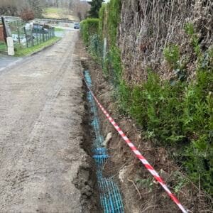 Réalisation d’une tranchée pour passage d’un tuyaux d’eau et France télécom